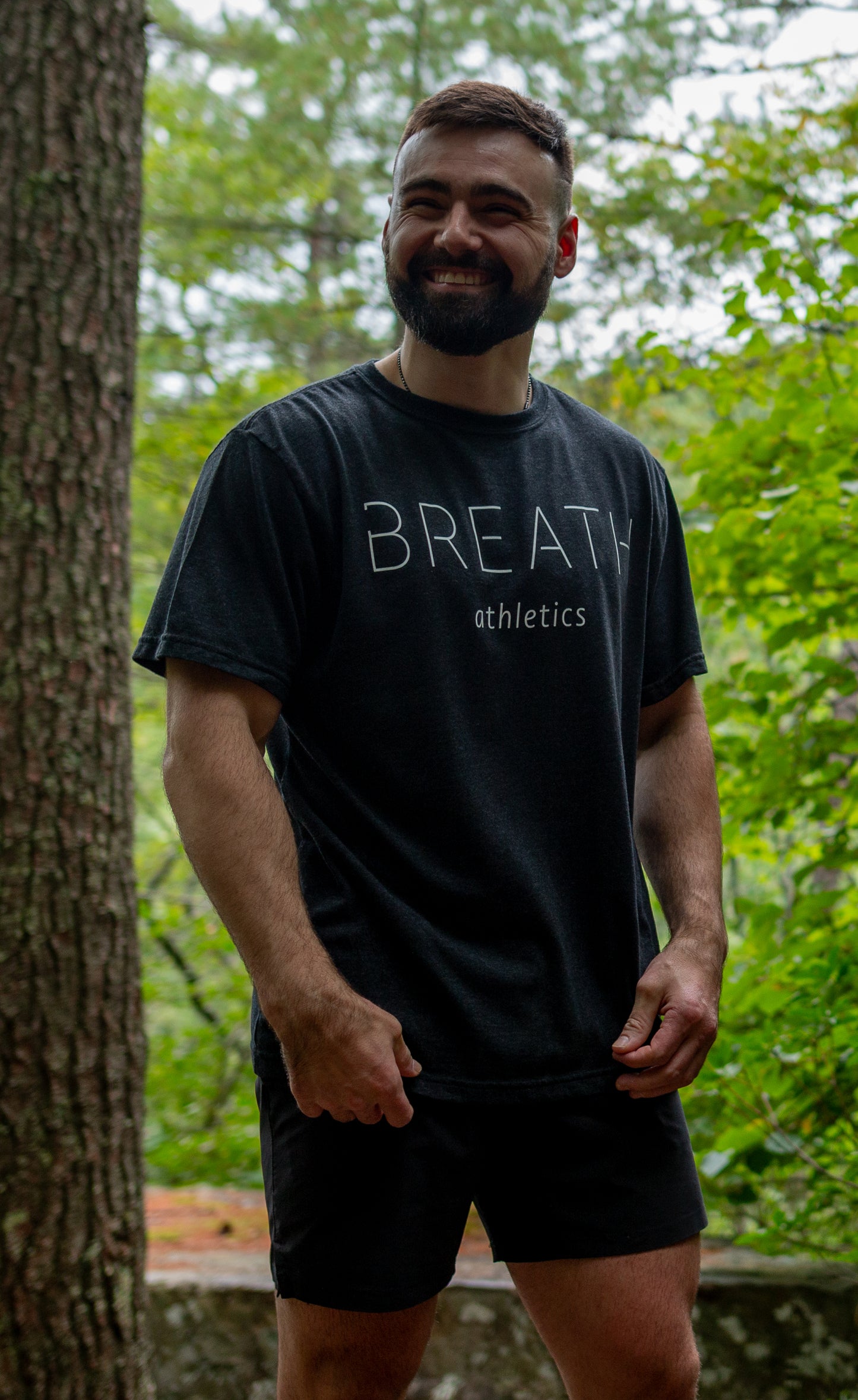The Front of the Breath Black 50/50 Cotton Recycled Polyester Blended Short Sleeve T shirt with the word Breath Across the Front.