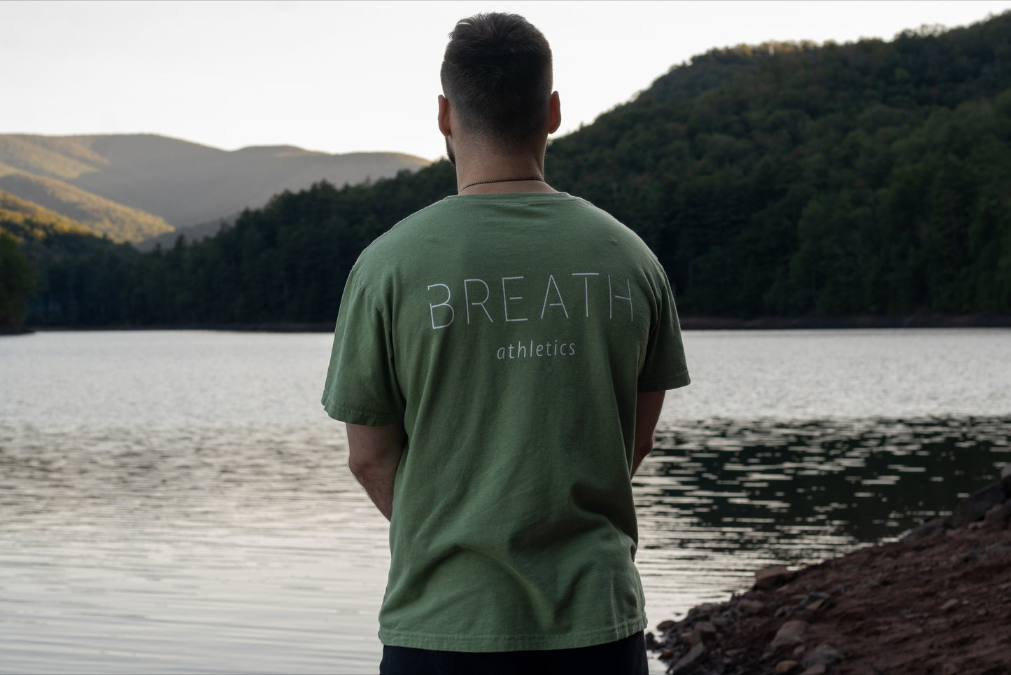 100% organic cotton Light Mint Green T Shirt, back with logo on chest brand name Breath on the back.