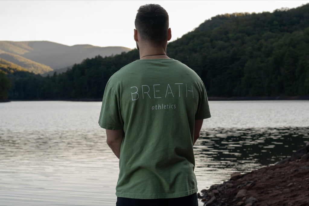 100% organic cotton Light Mint Green T Shirt, back with logo on chest brand name Breath on the back.